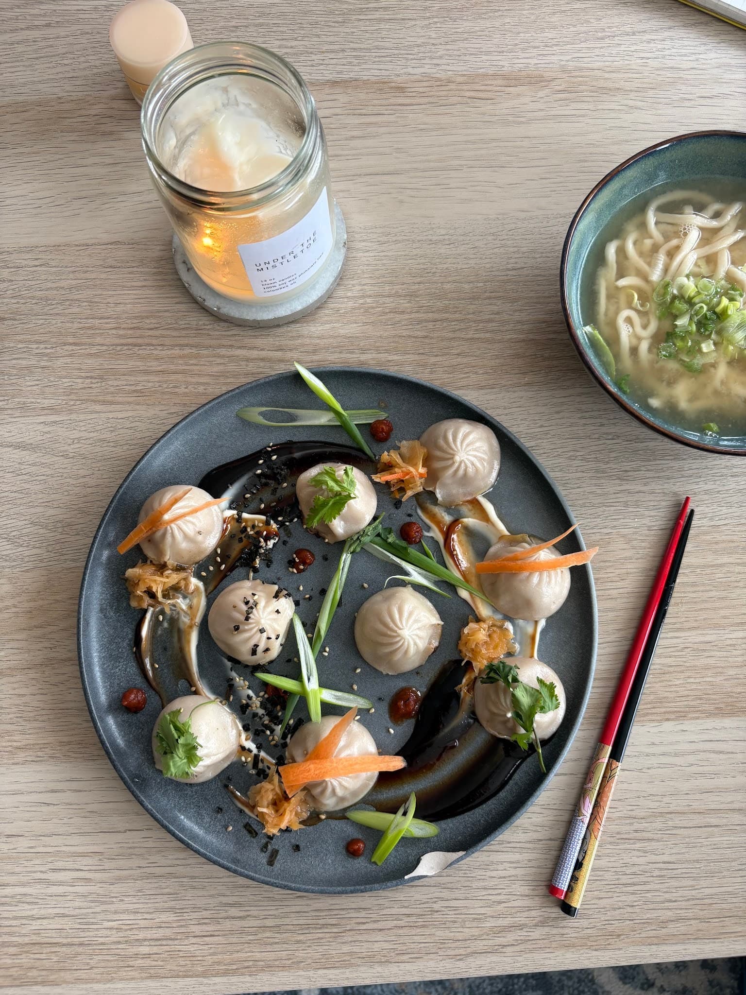 An assortment of small plates with vegetables and seafood